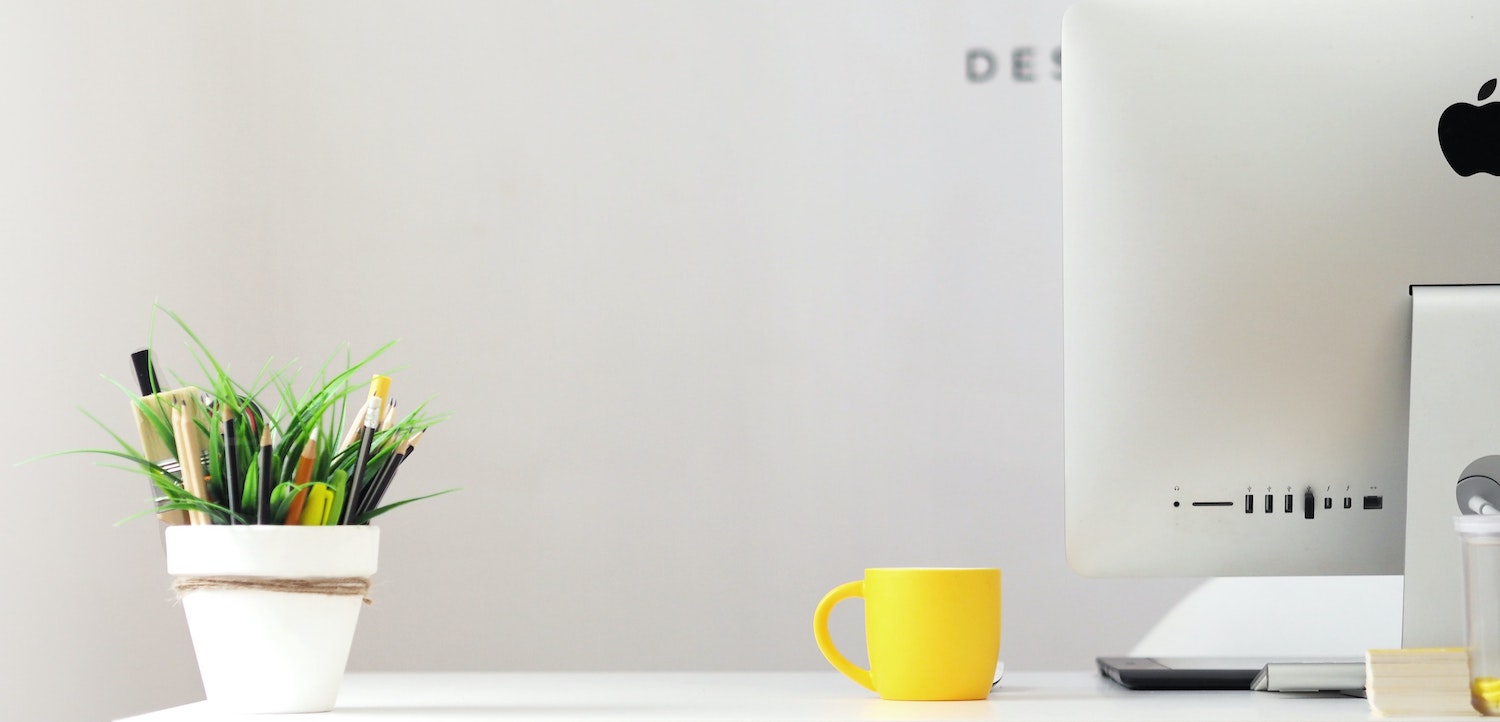 Computer and cup of coffee